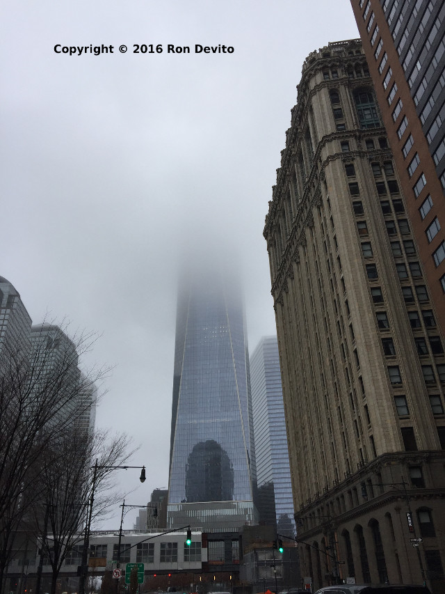 One WTC shrouded in fog about 800 feet up.