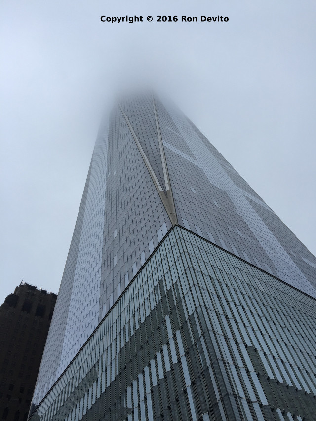 One WTC shrouded in fog about 800 feet up.