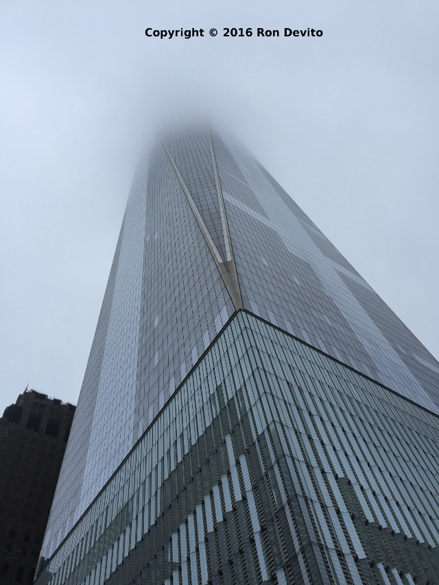 One WTC shrouded in fog about 800 feet up.