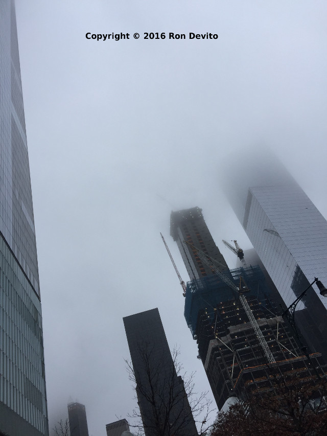 Four WTC shrouded in fog about 800 feet up.