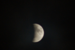 Supermoon eclipse - the moon is about 3/8 covered. This was the last time we saw enough of the moon to take an exposure.  Taken 9:55:36 PM EDT at Front St. behind the SIRT train shed September 27, 2015.
